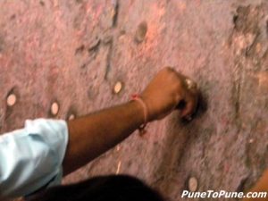 Sticking coins of belief